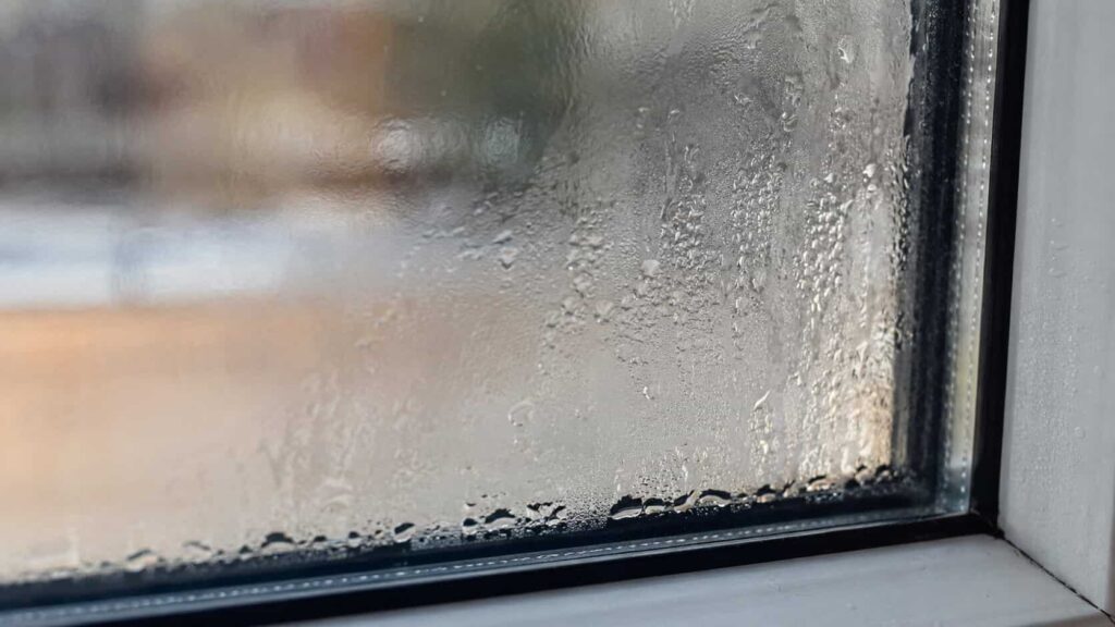 Water droplets and haze inside a double-pane window caused by a failed perimeter seal